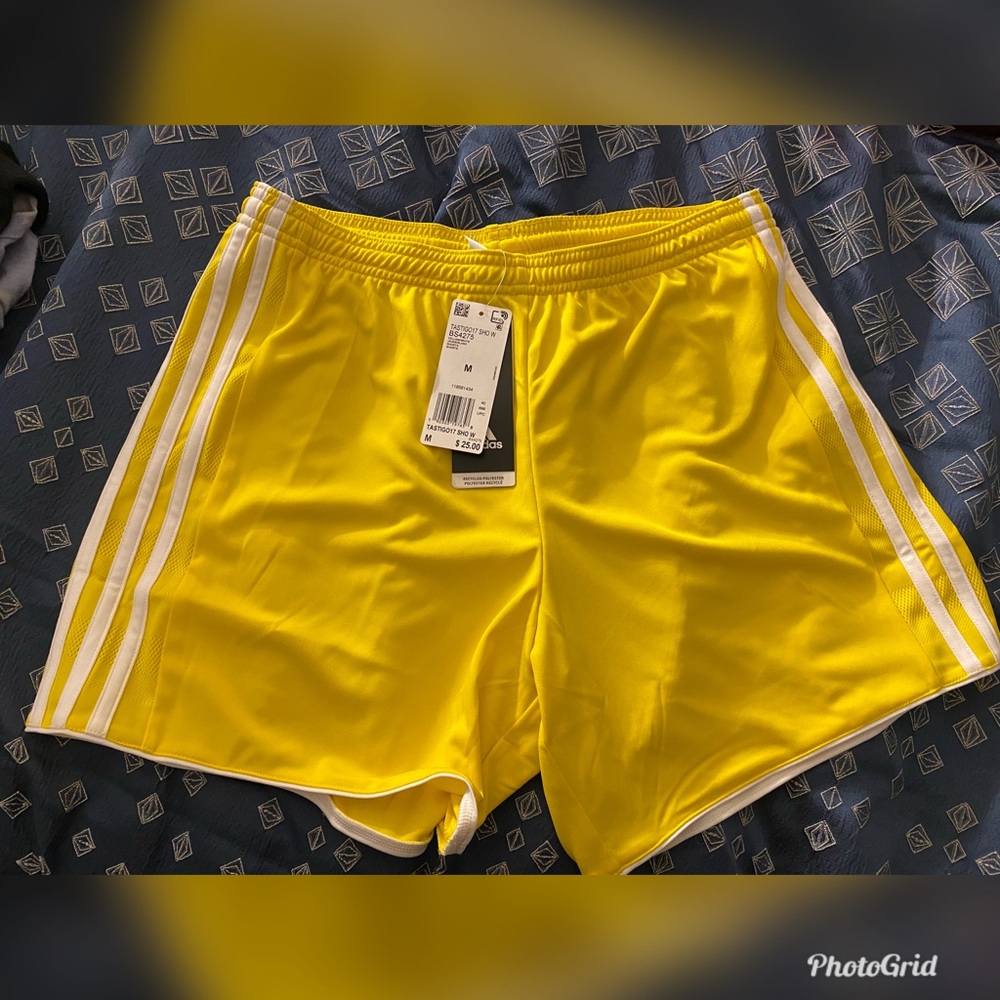 Yellow and white stripe adidas shorts